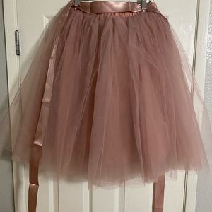 Mauve Tutu skirt with ribbon.